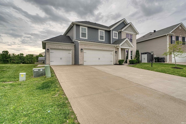 5783 Brookstone Dr, Newburgh, IN 47630 - view of front facade featuring a front yard, concrete driveway, and brick siding