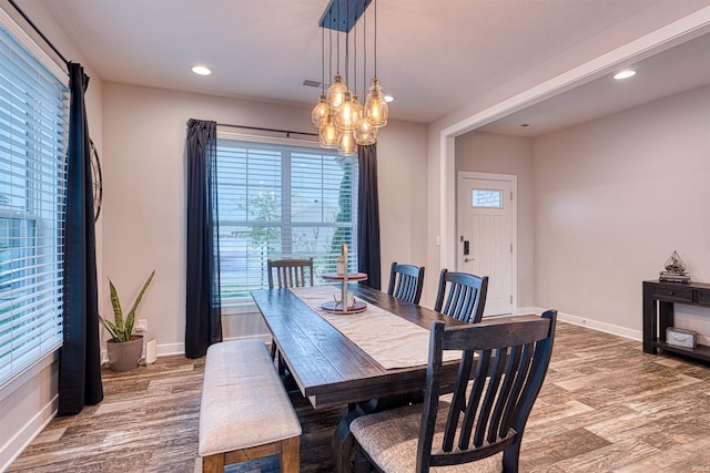 5783 Brookstone Dr, Newburgh, IN 47630 - dining room featuring light wood-style floors, baseboards, recessed lighting, and a chandelier