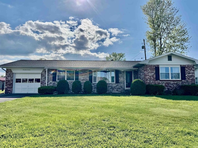 1719 Linwood Dr, Bedford, IN 47421 - ranch-style home with an attached garage, a front yard, asphalt driveway, and brick siding