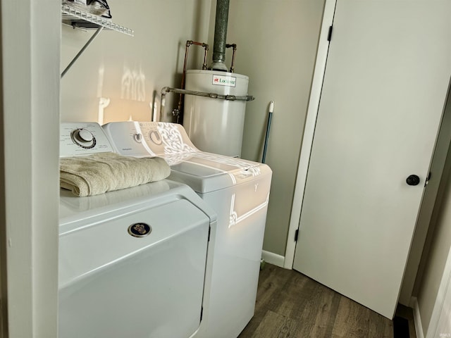 1719 Linwood Dr, Bedford, IN 47421 - laundry room featuring water heater, washing machine and dryer, and dark wood finished floors