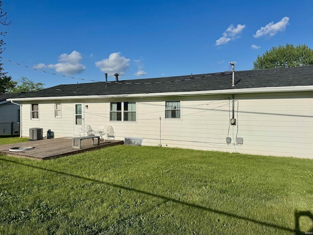 1719 Linwood Dr, Bedford, IN 47421 - rear view of house featuring cooling unit, a lawn, and a wooden deck