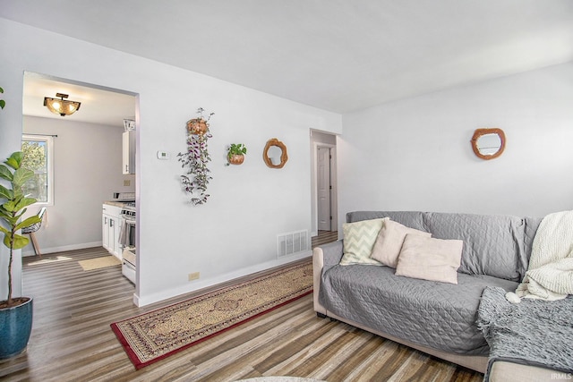 2017 Delaware St, Mishawaka, IN 46544 - living area with wood finished floors and baseboards