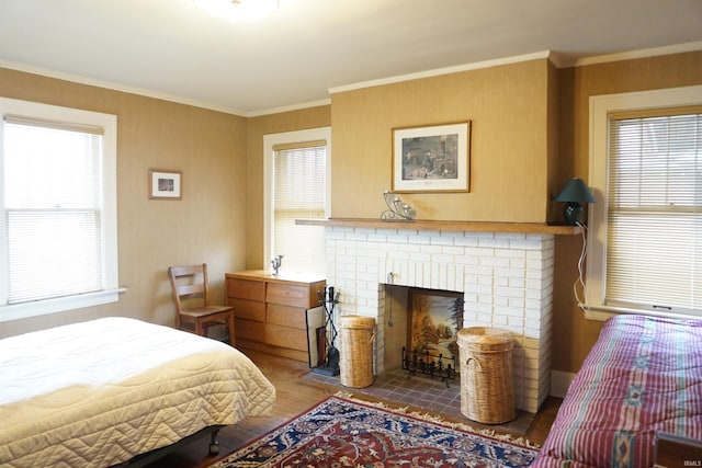 1208 Leeper Ave, South Bend, IN 46617 - bedroom featuring wood finished floors and a fireplace