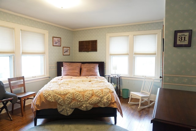1208 Leeper Ave, South Bend, IN 46617 - bedroom with multiple windows, hardwood / wood-style flooring, wallpapered walls, and ornamental molding