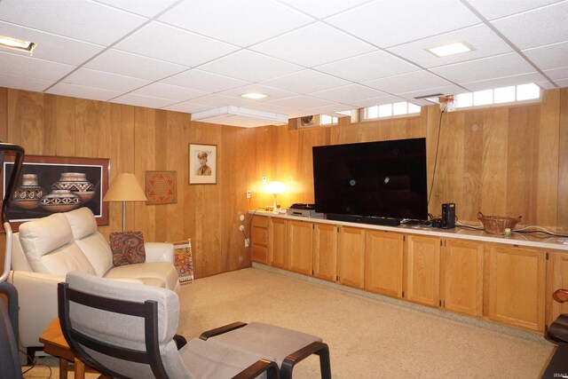 1208 Leeper Ave, South Bend, IN 46617 - living area with wood walls and a drop ceiling