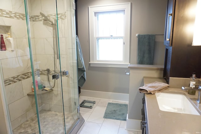 1208 Leeper Ave, South Bend, IN 46617 - bathroom with a stall shower, baseboards, tile patterned flooring, and vanity