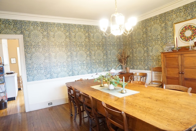 1208 Leeper Ave, South Bend, IN 46617 - dining space featuring wallpapered walls, a chandelier, ornamental molding, a wainscoted wall, and wood-type flooring