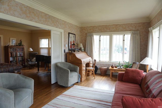 1208 Leeper Ave, South Bend, IN 46617 - living area with wallpapered walls, healthy amount of natural light, wood finished floors, and crown molding