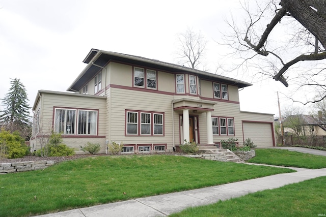 1208 Leeper Ave, South Bend, IN 46617 - view of front of property with driveway, a front yard, and a garage
