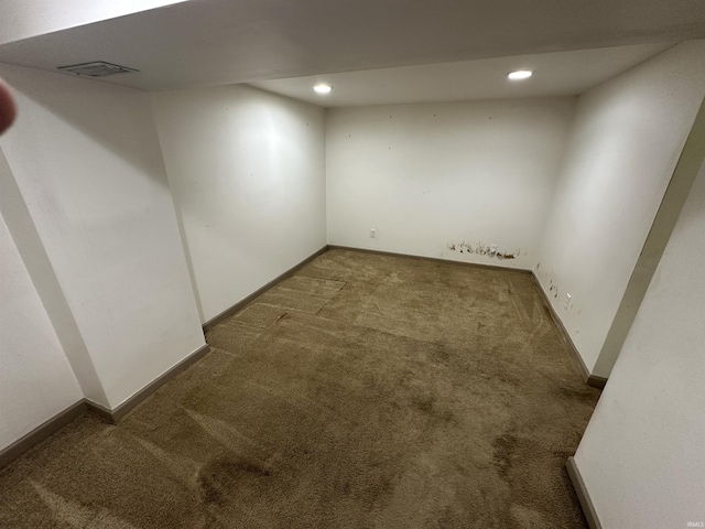 finished basement featuring carpet floors, recessed lighting, and baseboards
