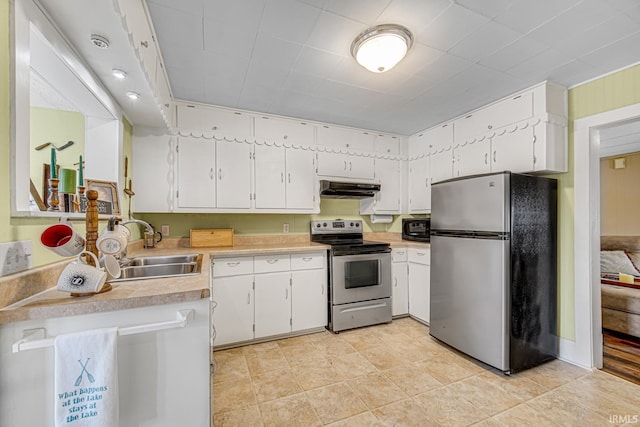 kitchen featuring appliances with stainless steel finishes, under cabinet range hood, a sink, light countertops, and white cabinets