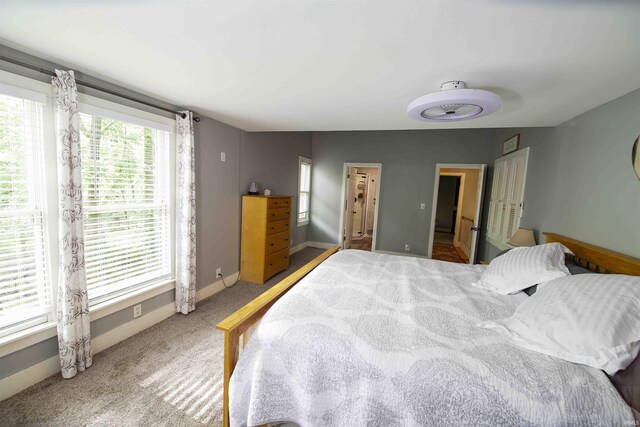 8209 Berry Dr, Evansville, IN 47710 - bedroom with light colored carpet and baseboards