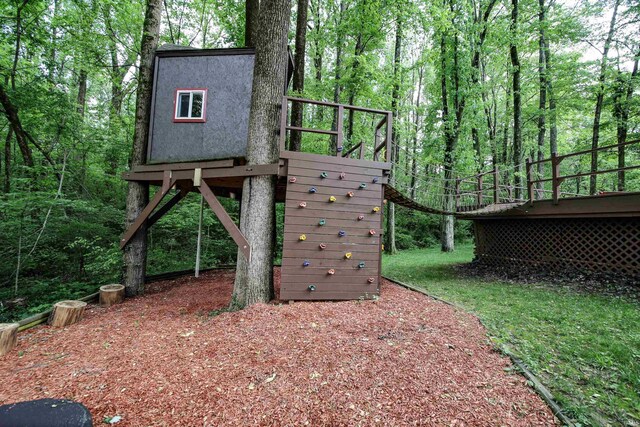 8209 Berry Dr, Evansville, IN 47710 - view of yard with a deck and a wooded view