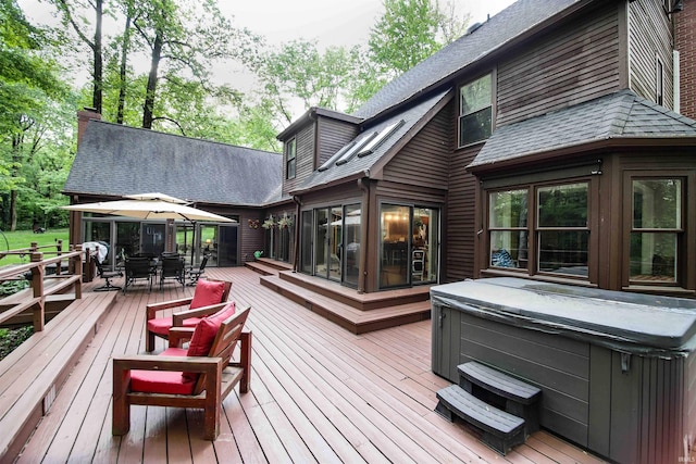 8209 Berry Dr, Evansville, IN 47710 - deck featuring a hot tub, outdoor dining space, and a gazebo