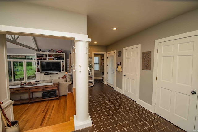 8209 Berry Dr, Evansville, IN 47710 - hall with recessed lighting, decorative columns, wood finished floors, and baseboards