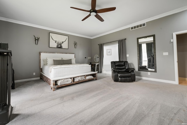 bedroom featuring ornamental molding, carpet floors, baseboards, and a ceiling fan