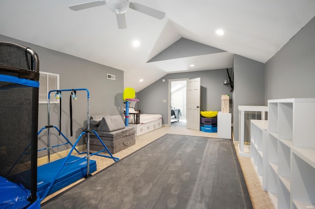 workout room with vaulted ceiling, a ceiling fan, and recessed lighting