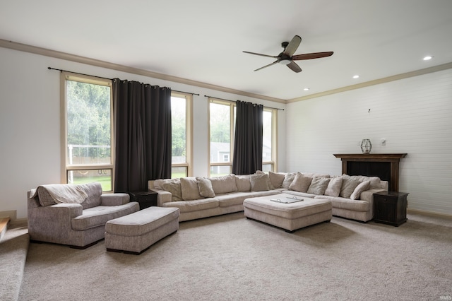carpeted living area with ceiling fan and recessed lighting