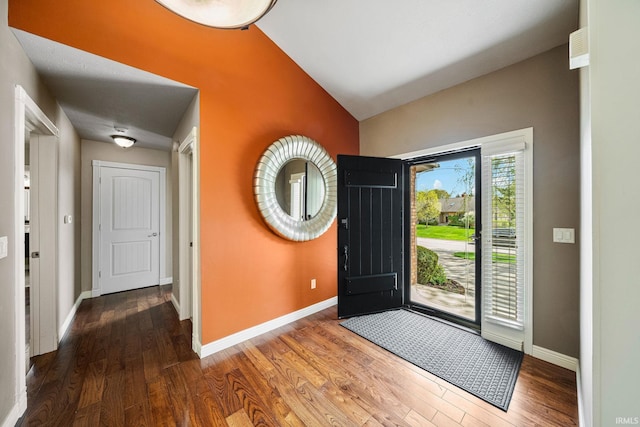 51167 Huntington Ln, Granger, IN 46530 - foyer with baseboards, wood finished floors, and vaulted ceiling