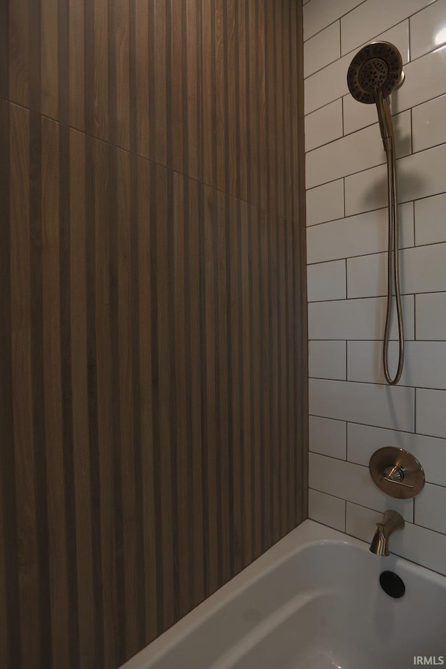 bathroom featuring washtub / shower combination