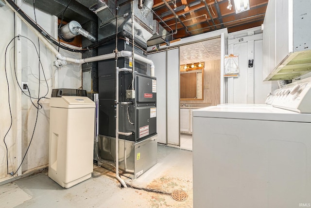 unfinished below grade area with independent washer and dryer and a water softener system