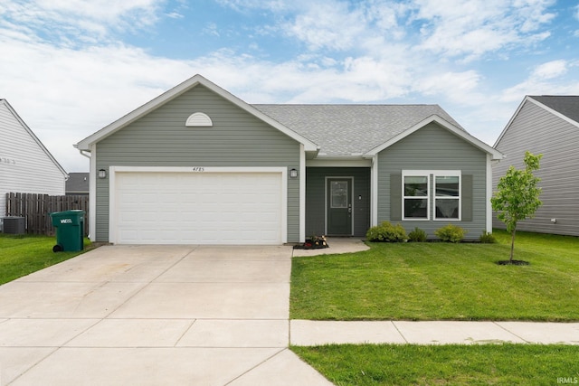ranch-style home with driveway and an attached garage