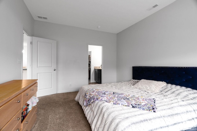 carpeted bedroom with baseboards