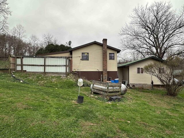15850-2 Witt Rd, Shoals, IN 47581 - rear view of house with a chimney