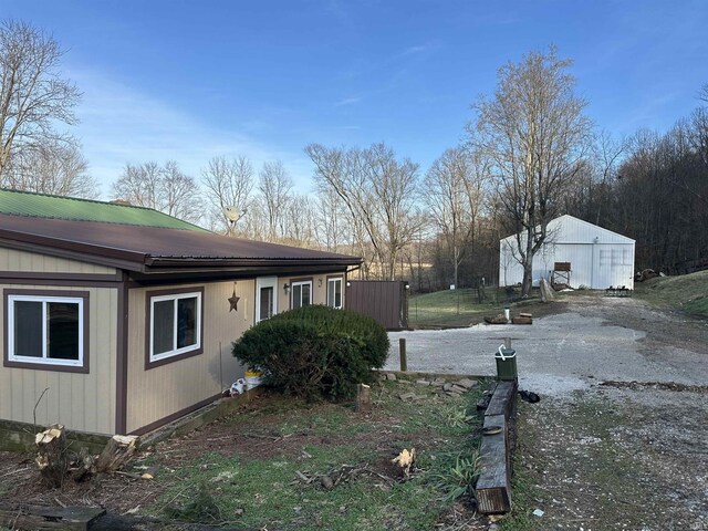 15850-2 Witt Rd, Shoals, IN 47581 - view of property exterior with metal roof and an outdoor structure