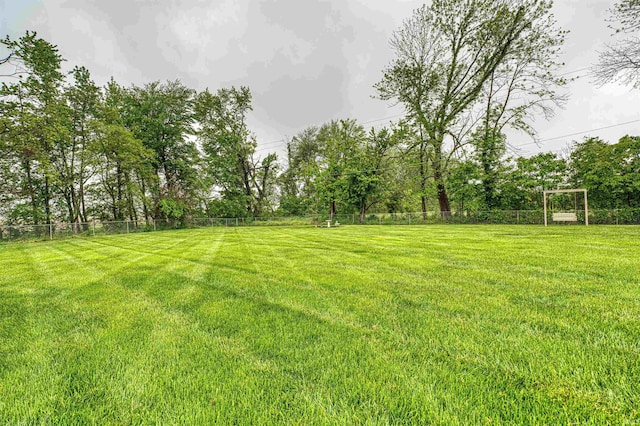 view of yard featuring fence