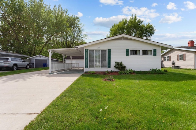 view of front of house with driveway, a front lawn, a carport, and central air condition unit