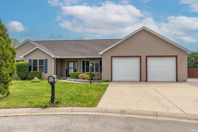 view of front of property featuring a front yard, concrete driveway, a garage, and a shingled roof