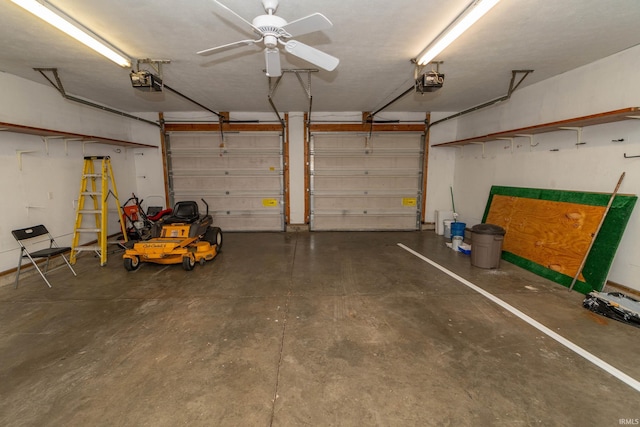 garage featuring a garage door opener and ceiling fan