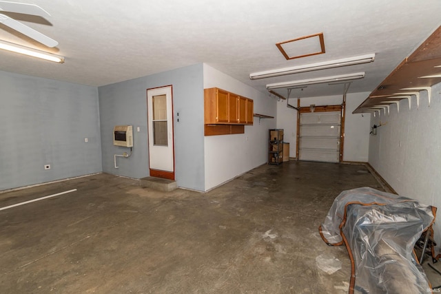 garage featuring heating unit