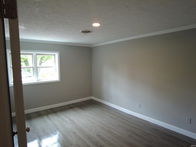 4702 N 37th Hwy, Bedford, IN 47421 - empty room with crown molding, a textured ceiling, dark wood-style flooring, baseboards, and recessed lighting