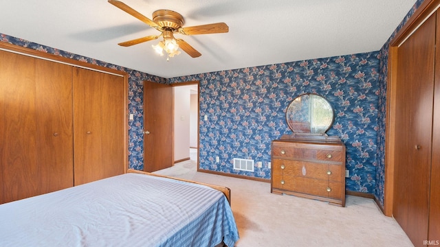 2285 S Salem Rd, Monroe, IN 46772 - bedroom featuring carpet flooring, a closet, baseboards, ceiling fan, and wallpapered walls