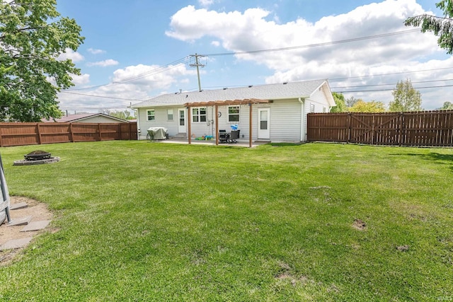 4070 W 3rd St, Bloomington, IN 47404 - rear view of property with a fire pit and a patio area