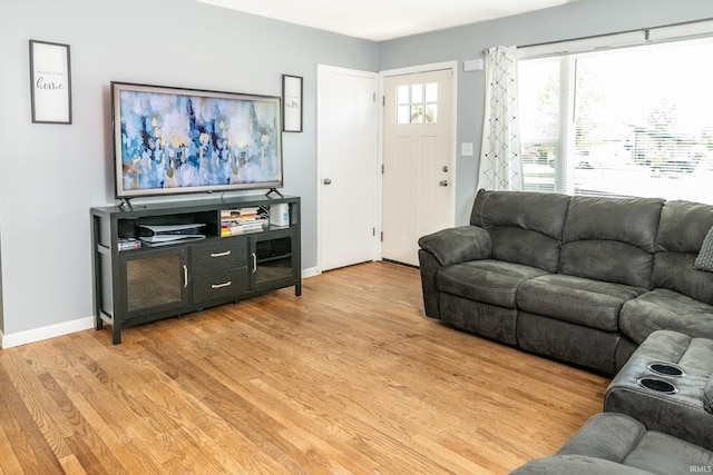 4070 W 3rd St, Bloomington, IN 47404 - living room featuring light wood finished floors and baseboards