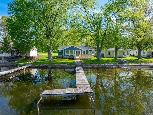 5363 W Warren Ave, Silver Lake, IN 46982 - dock featuring a yard and a deck with water view