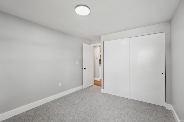 5363 W Warren Ave, Silver Lake, IN 46982 - unfurnished bedroom featuring carpet flooring, a closet, and baseboards