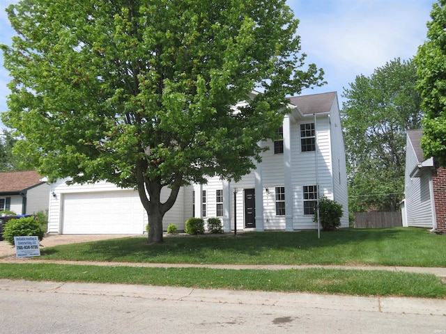 view of front of home with a front lawn and driveway