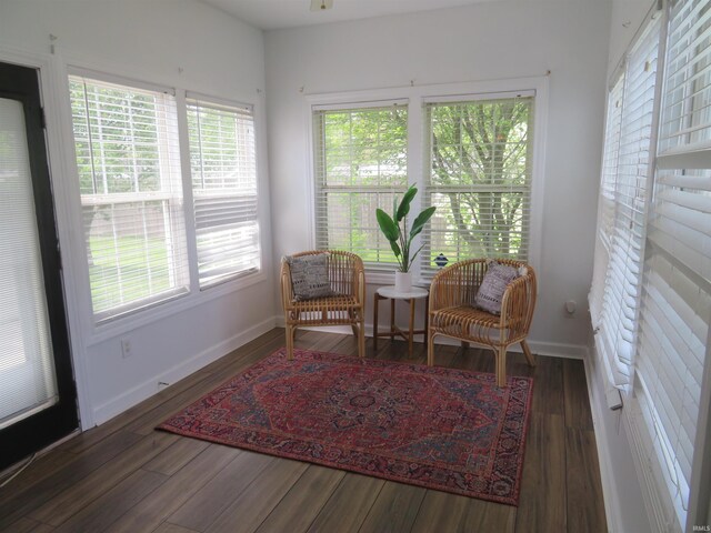 sitting room featuring wood finished floors and baseboards
