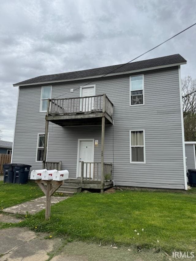 455 E Barner St, Frankfort, IN 46041 - back of property with a balcony and a yard