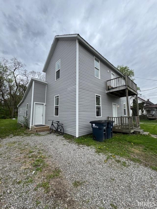 455 E Barner St, Frankfort, IN 46041 - rear view of property featuring a balcony and a wooden deck