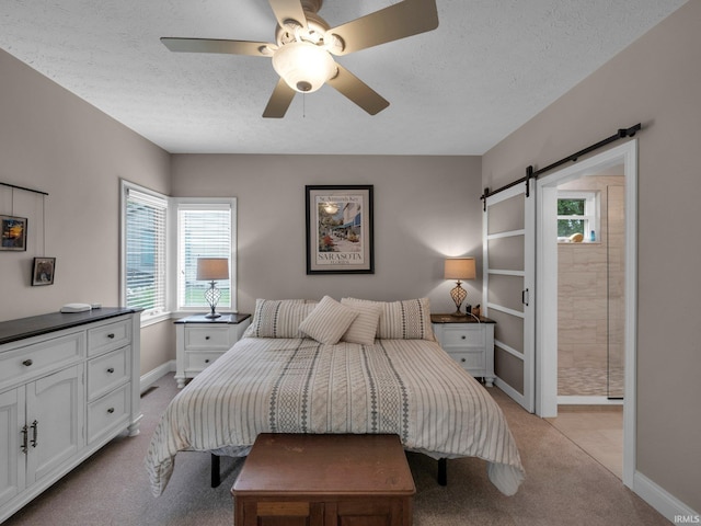 1745 Mill Pond Ln, Lafayette, IN 47905 - bedroom with a barn door, light carpet, a textured ceiling, baseboards, and a ceiling fan