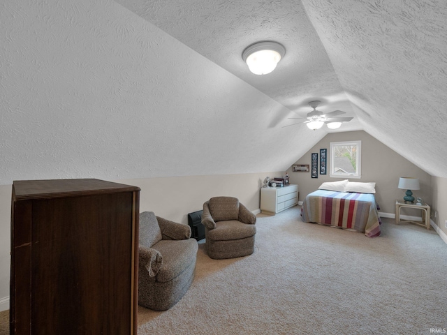 1745 Mill Pond Ln, Lafayette, IN 47905 - bedroom featuring a textured ceiling, vaulted ceiling, baseboards, carpet floors, and a ceiling fan