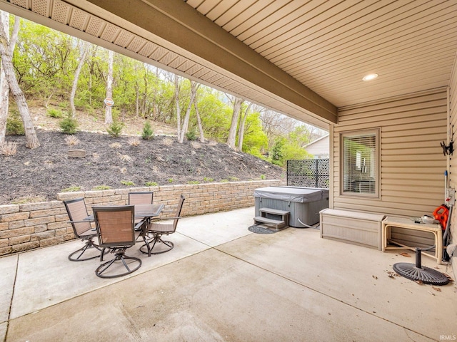 1745 Mill Pond Ln, Lafayette, IN 47905 - view of patio / terrace with a hot tub and outdoor dining space