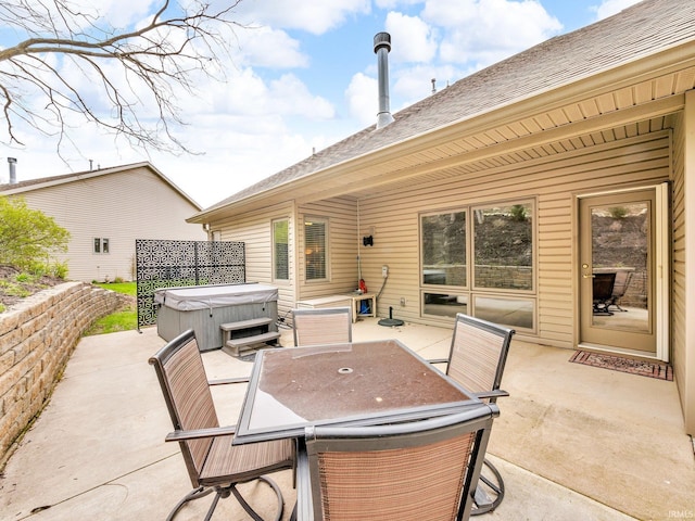 1745 Mill Pond Ln, Lafayette, IN 47905 - view of patio featuring a hot tub and outdoor dining space