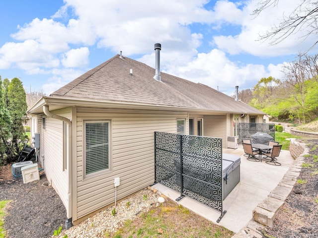 1745 Mill Pond Ln, Lafayette, IN 47905 - back of house featuring a patio area and a shingled roof