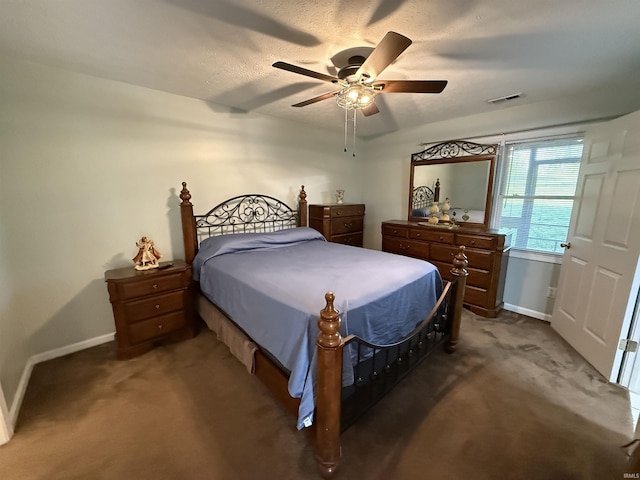 9607 S Lake Ridge Dr, Bloomington, IN 47401 - carpeted bedroom with baseboards and a ceiling fan